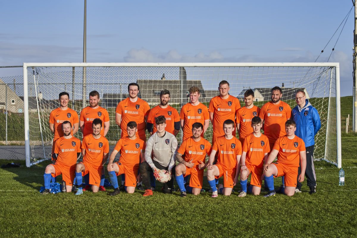 Football team in front of goal